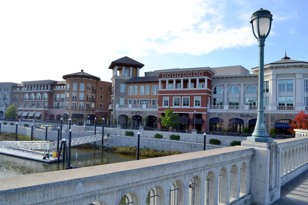 Colorful downtown Napa riverfront buildings and waterfront promenade beside the Napa River. Destination photo. — destination photo, not the race course